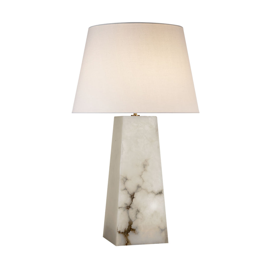The Evoke Large Table Lamp is an earthy looking table light with an alabaster, column body and a round linen shade.