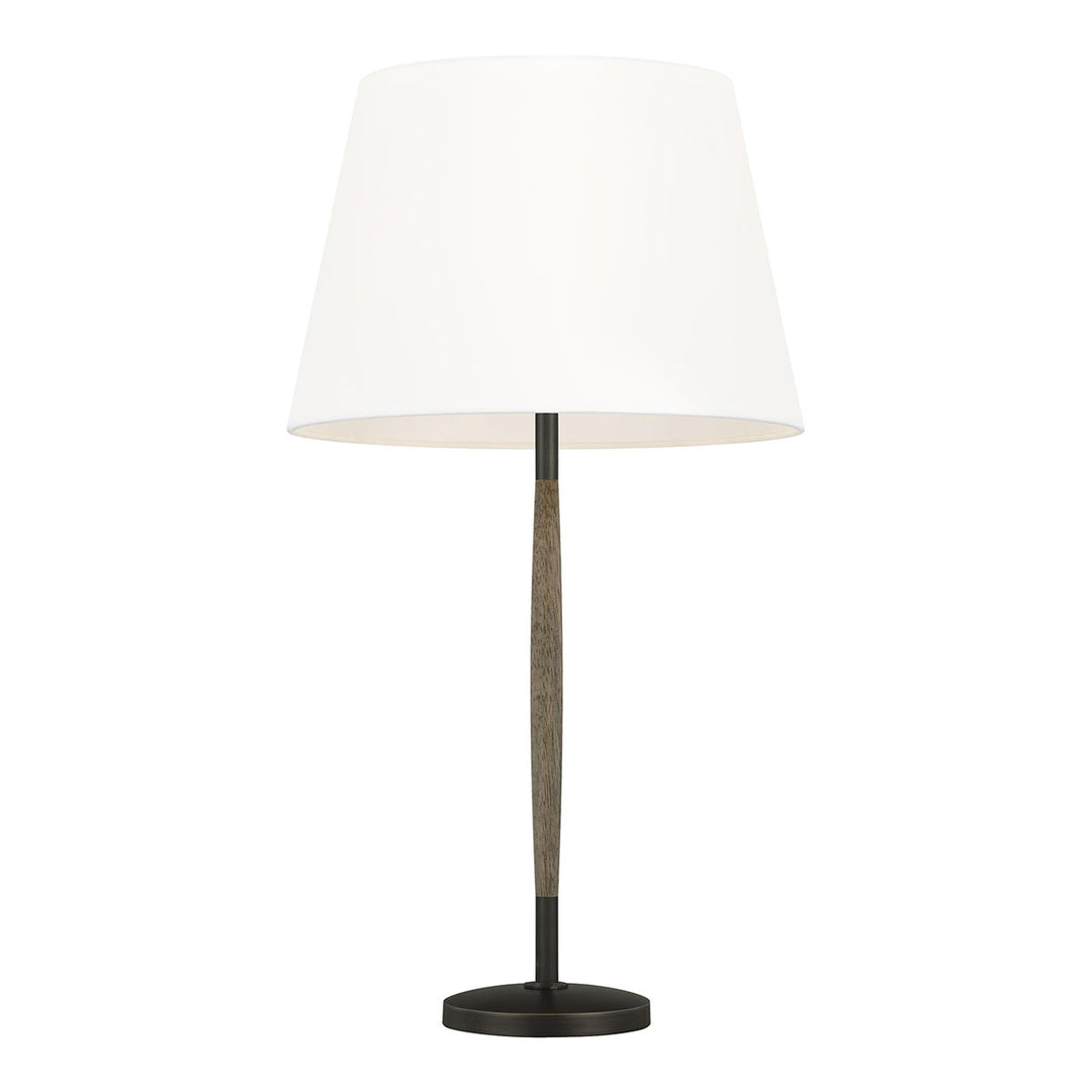 Santos Table Lamp. MInimal, classic table lamp with a weathered oak base and aged pewter details and a white linen shade.