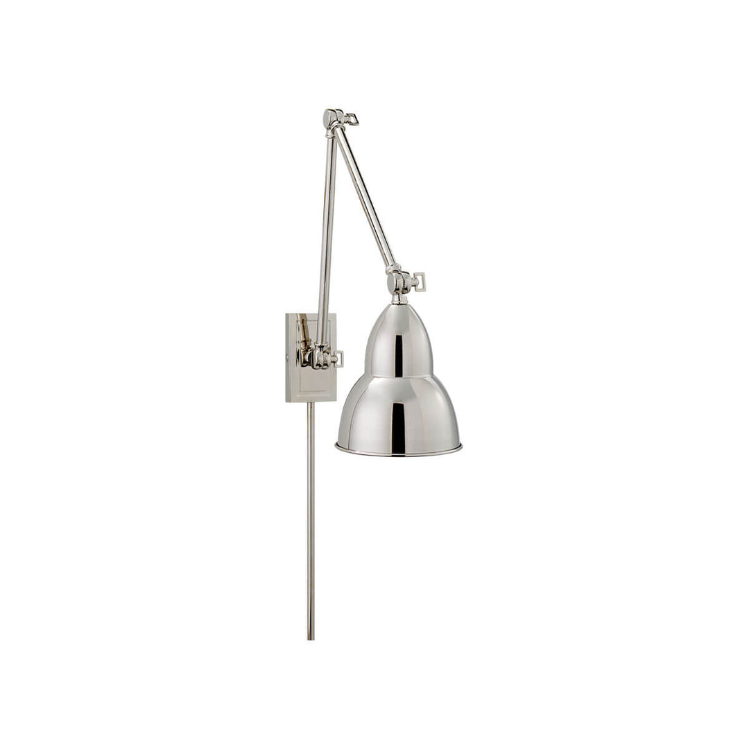 The French Library Wall Lamp hinges in three spots and has a classic shape in a polished nickel finish.