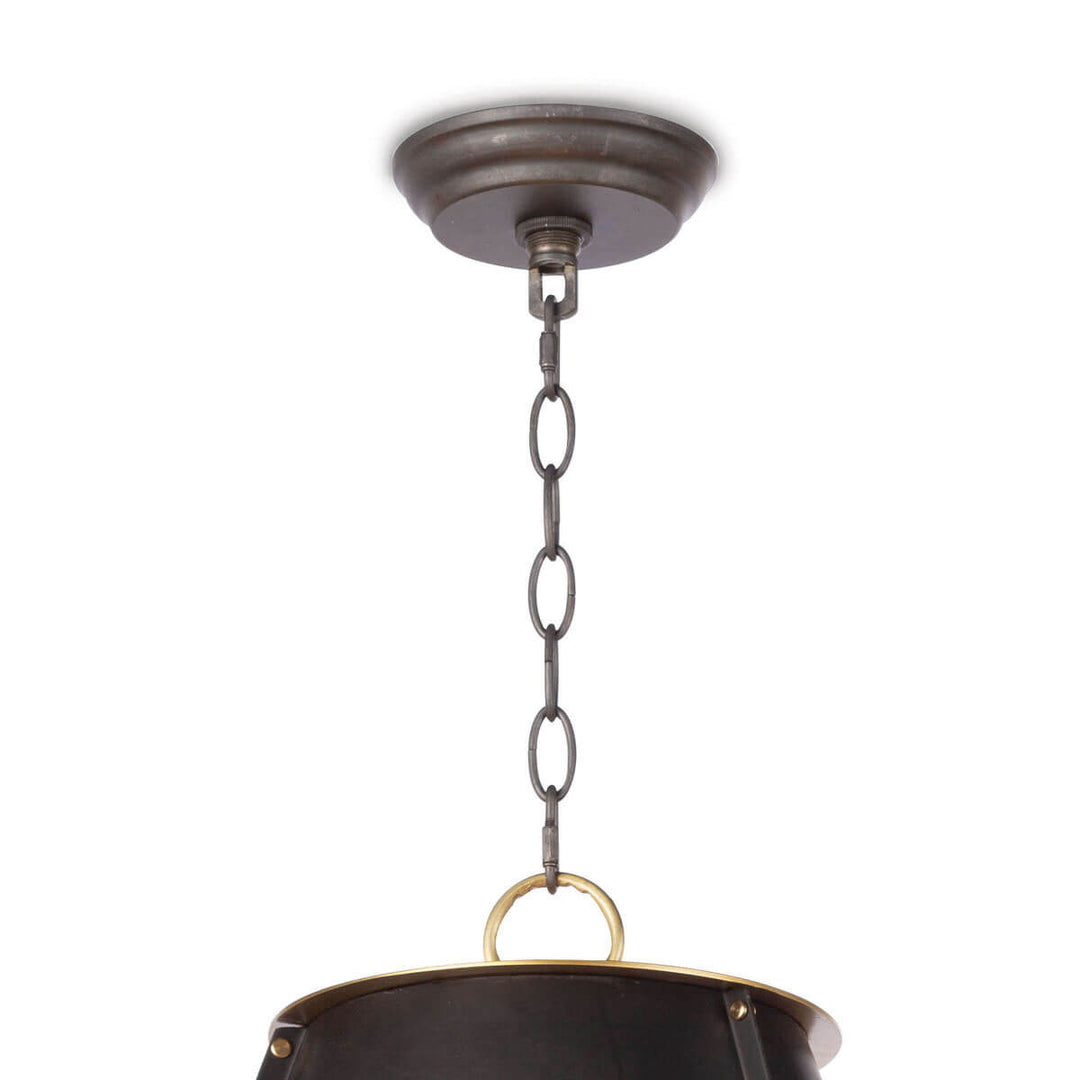 Closeup of the black canopy and chain on the metal, modern farmhouse pendant light.
