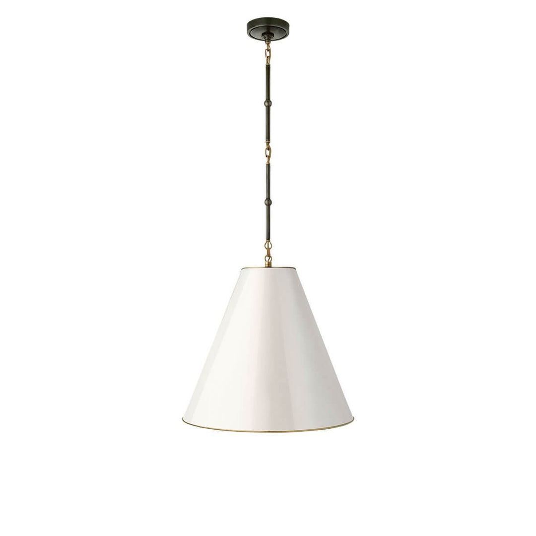 The Hartford Medium Hanging Light has a delicate bronze chain with antique brass detail and antique white cone shaped shade with a brass interior.