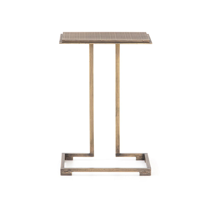 Habitas side table in antique brass with acid etching.
