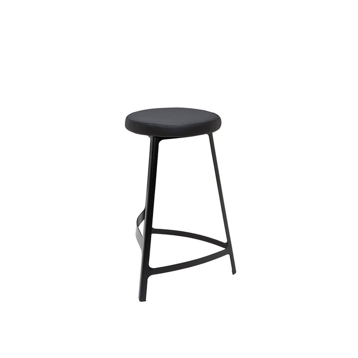 Modern counter stool with a matte black metal frame and naugahyde seat.