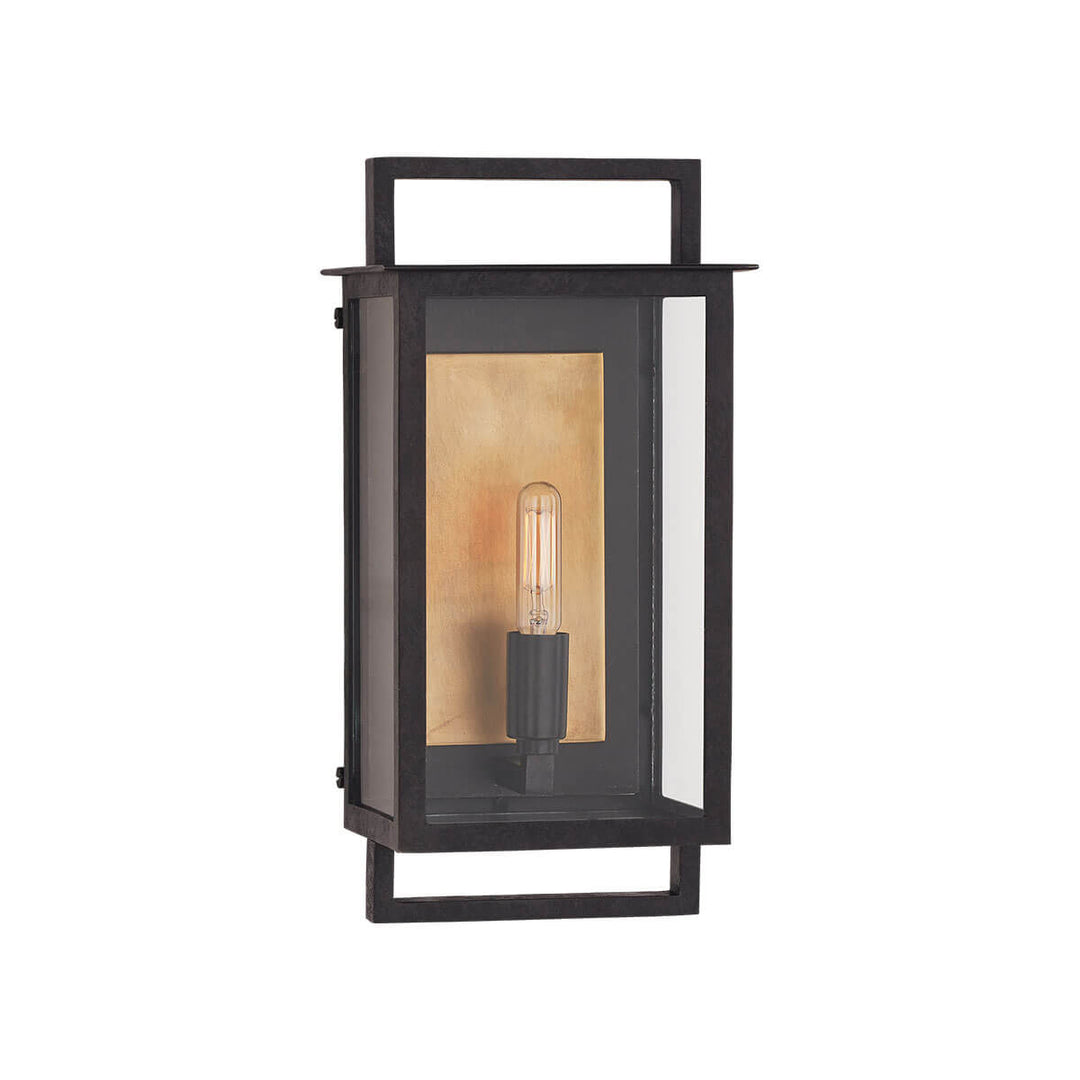 The Halle Wall Sconce is an updated lantern made from aged iron with a single bulb and contrasting colour backplate.