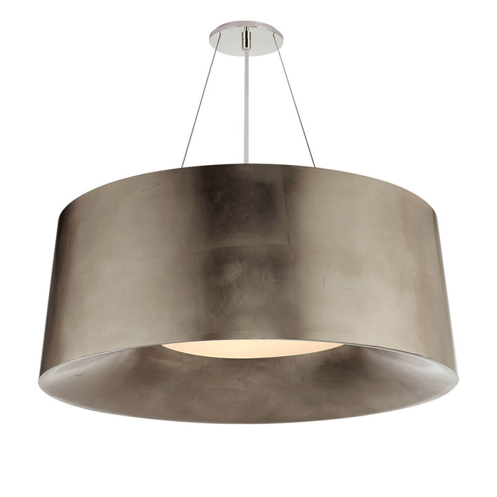The Halo Hanging Shade has a bold drum shaped, burnished silver leaf shade with simple canopy and hanger attachment.