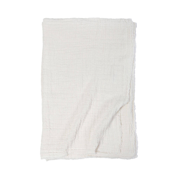 The Trento Oversized Throw is an double-sided gauzy weave throw blanket made from stonewashed cotton and linen