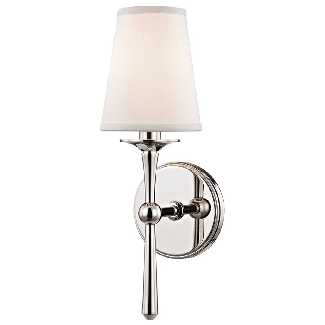 This traditional, polished nickel sconce has antique features such as its bobeche candle sleeves, faux silk shade, and cast metal.