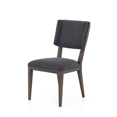 Dark wood dining chair with blue fabric seat and back.