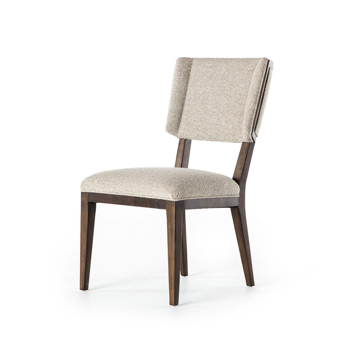 Winged dining chair with grey fabric and birch frame.