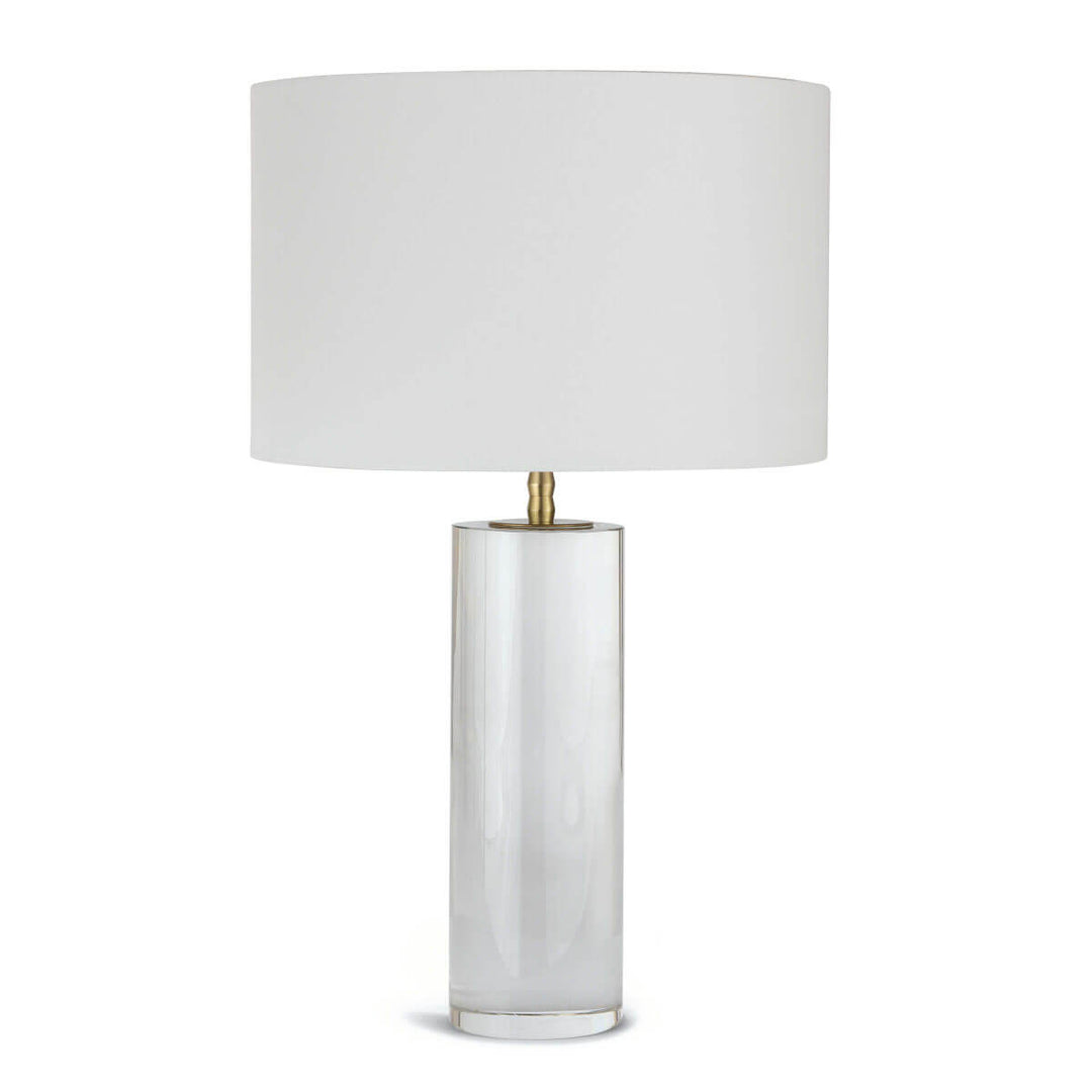 The Verona Table Lamp with a neutral stone base and white linen shade.