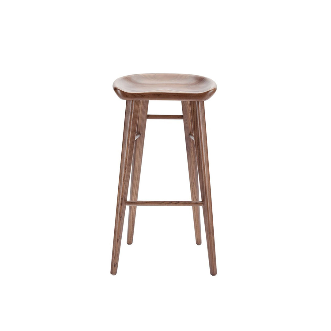The Camrose Bar Stool is simple and elegant and is made of solid wood with a curved seat and long, straight legs.