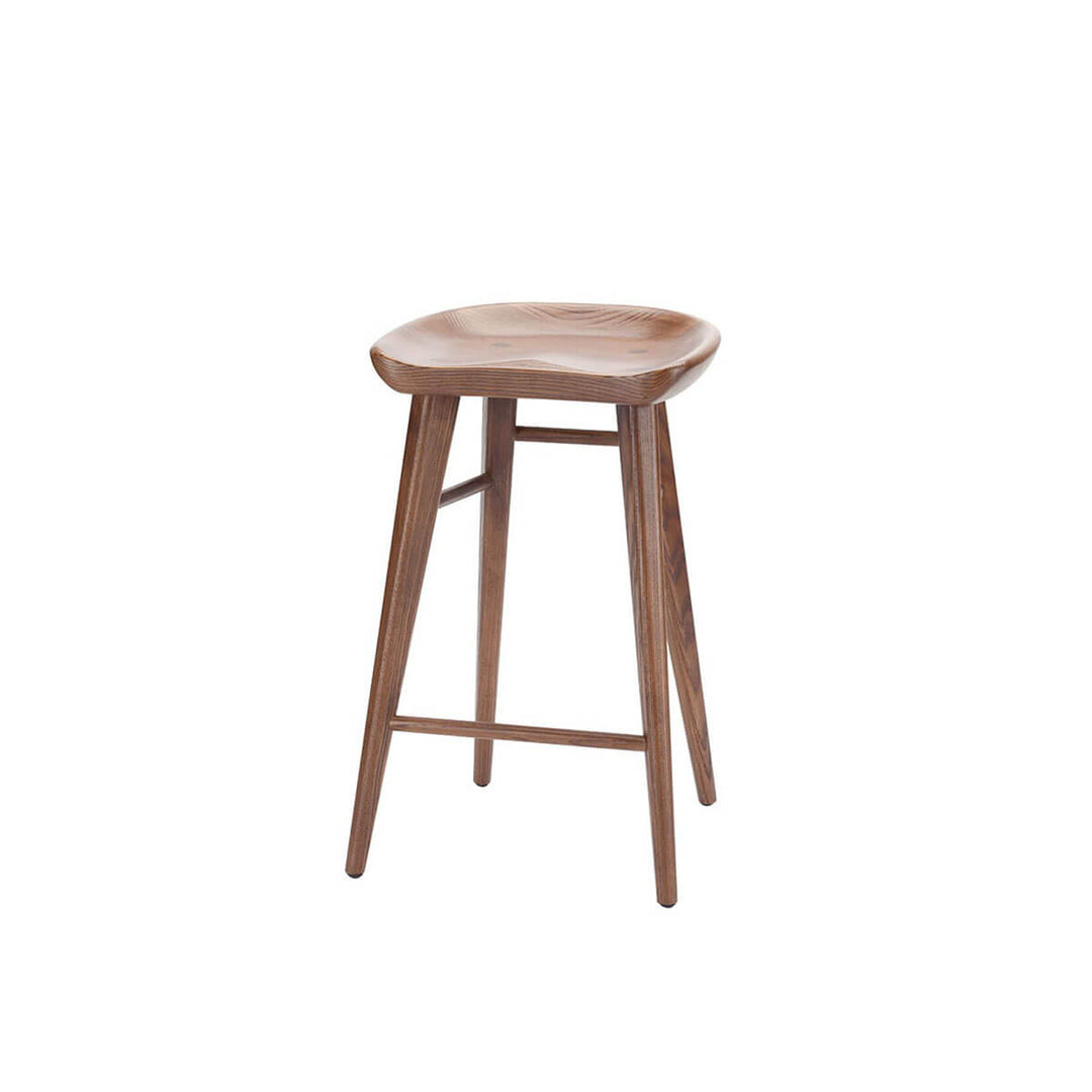 Classic backless counter stool made from solid wood with a curved seat and long, straight legs.