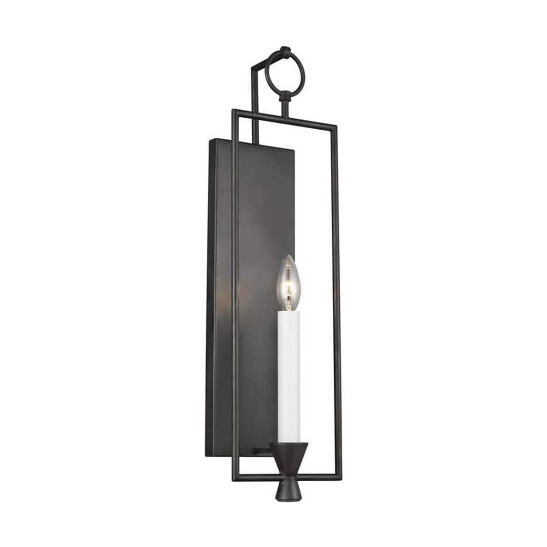 Traditional candelabra wall sconce in an antique iron finish.
