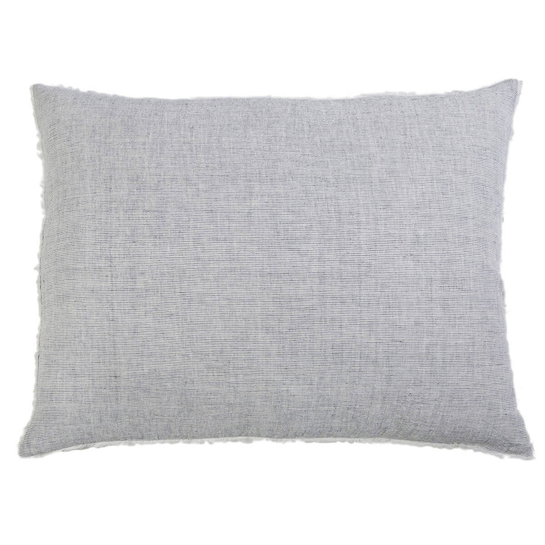 Rectangular pillow sham made from navy linen with frayed edge details.