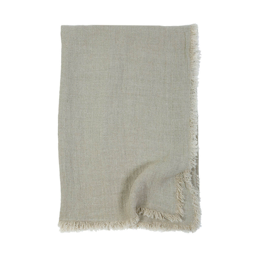 The Genoa Oversized Throw is an oversized light green throw with 100% linen with frayed edges.
