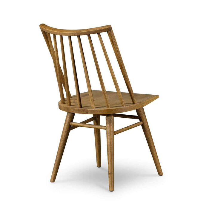 Solid wood dining chair with a spindle back in a light oak finish.