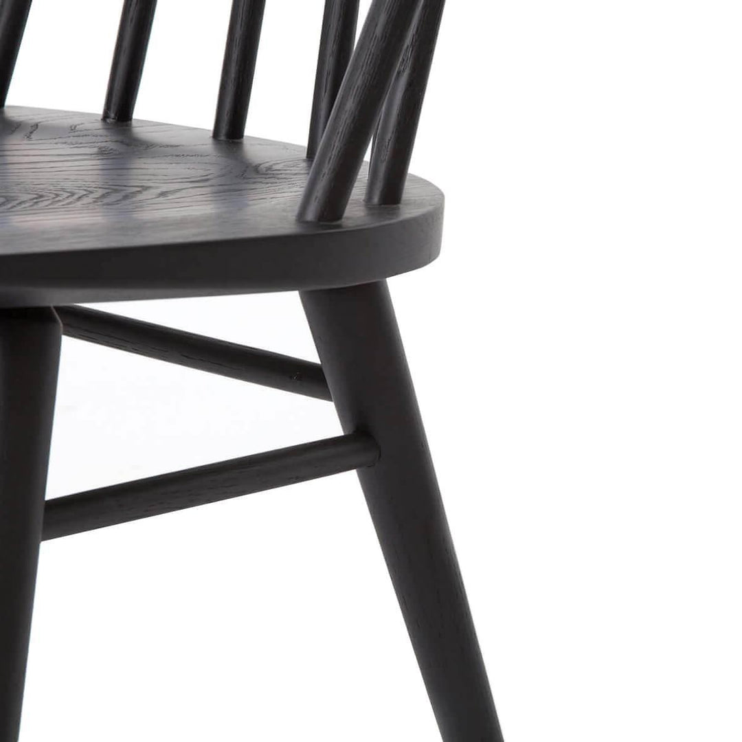  Spindle back, indented seat and tapered legs on the traditional dining chair.