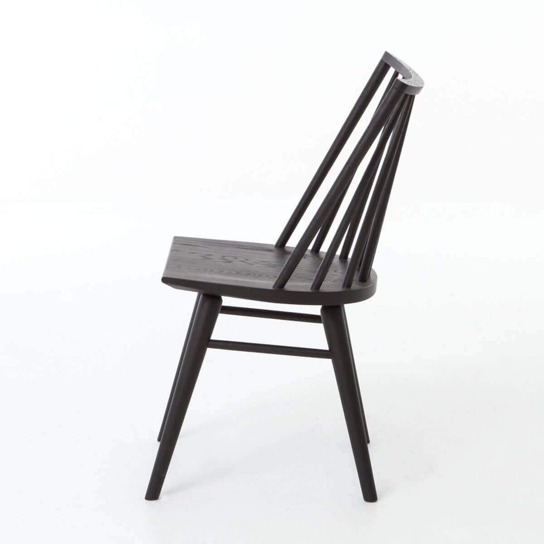 Side view of the Prineville Dining Chair in a black oak finish.