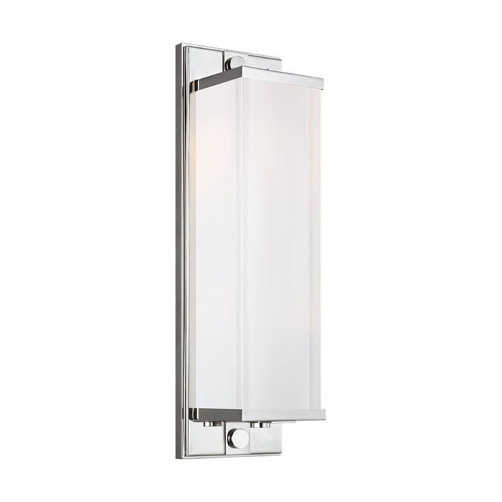 Modern wall sconce with rectangular lamp shade and a polished nickel finish.