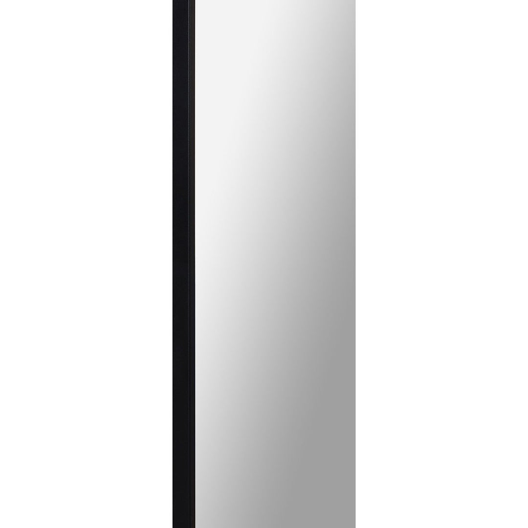 Thin frame in a powder-coated black iron finish on a modern mirror.