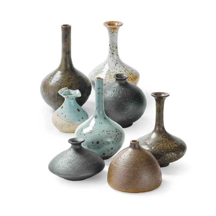 Ceramic vases in blues and neutrals.