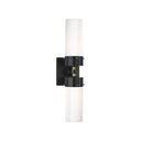 The Marais Double Wall Sconce has two white glass, cylindrical lamp shades and a bronze square backplate and hardware with antique brass details.