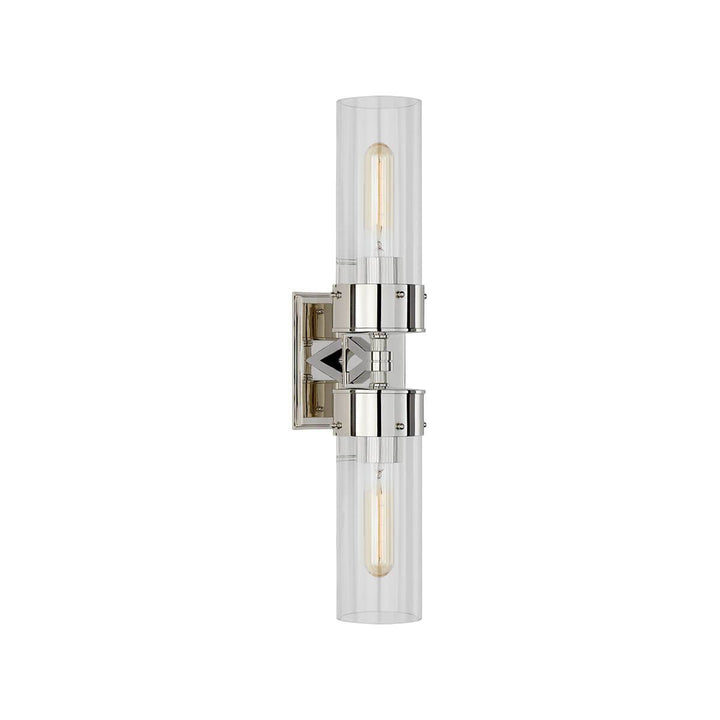 The Marais Double Wall Sconce has two clear glass, cylindrical lamp shades and a polished nickel square backplate and hardware.