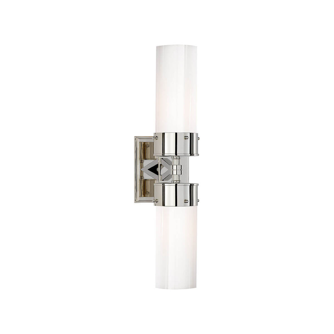 The Marais Double Wall Sconce has two white glass, cylindrical lamp shades and a polished nickel backplate and hardware.
