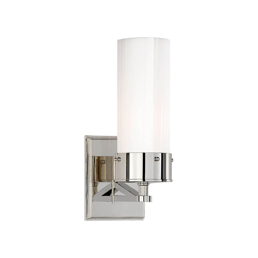 The Marais Wall Sconce has a polished nickel square backplate and covered bolts and a white glass cylindrical shade.