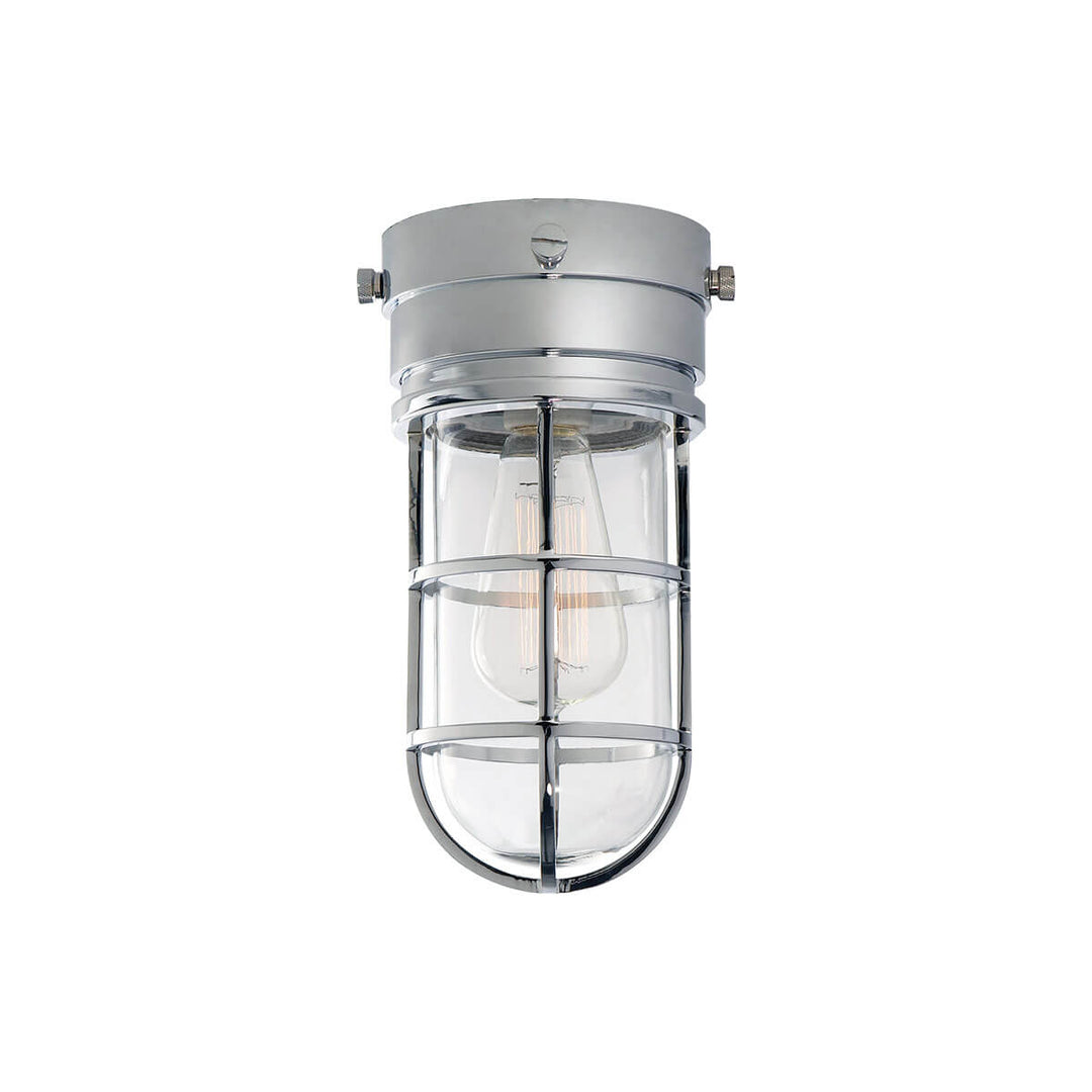The Marine Flush Mount is an industrial looking caged light with a chrome base and a clear glass shade.