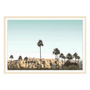 A dreamy piece of art that depicts the scenery of Palm Springs through a neutral palette full of beiges, blues, and greens.