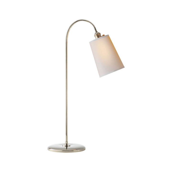 The Mia Table Lamp has a polished nickel stem with a curved top and a natural paper shade.