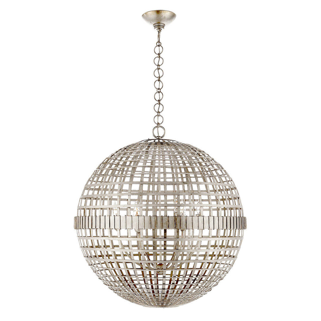 The Mill Globe Lantern is a large burnished silver leaf pendant light with a globe shade and a chain hanger.
