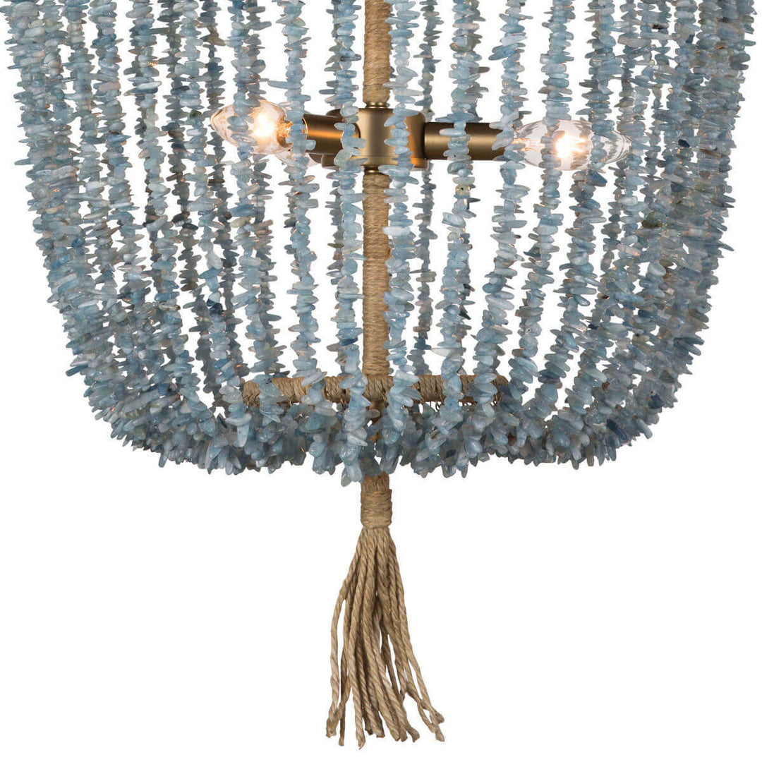 Closeup of the strings of aqua beads and tassel detail on the coastal style beaded chandelier.
