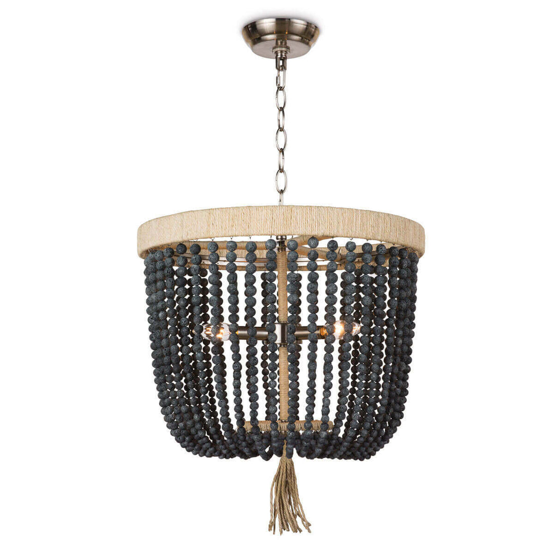 The Kuta Chandelier is a beaded chandelier with a rattan-wrapped frame, chain hanger, and blue black round beads.