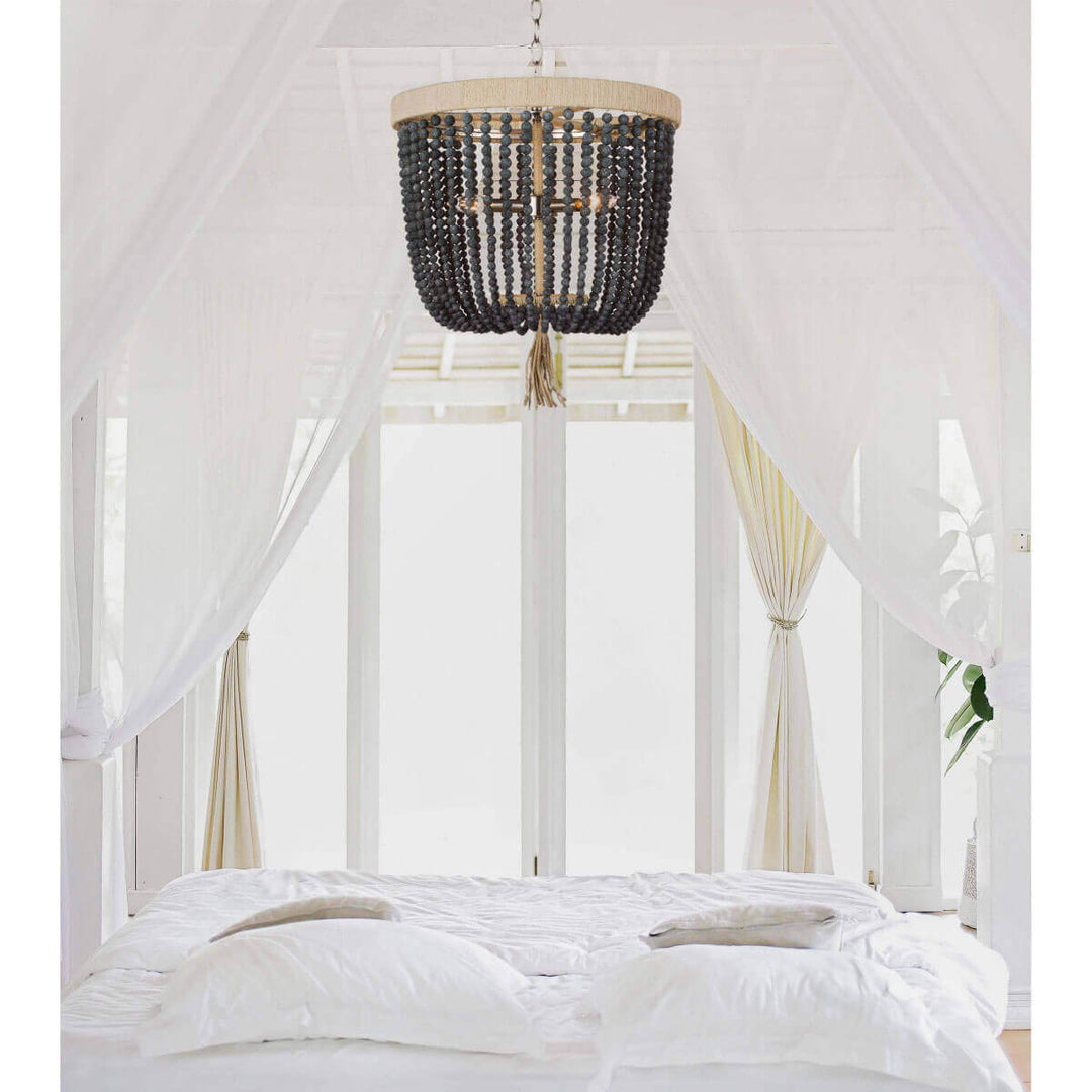 Beaded chandelier in a modern farmhouse bedroom.