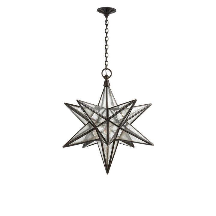 The Moravian Star Lantern is a star-shaped pendant light with antique iron joints, antique mirrored panels, and a delicate hanging chain.