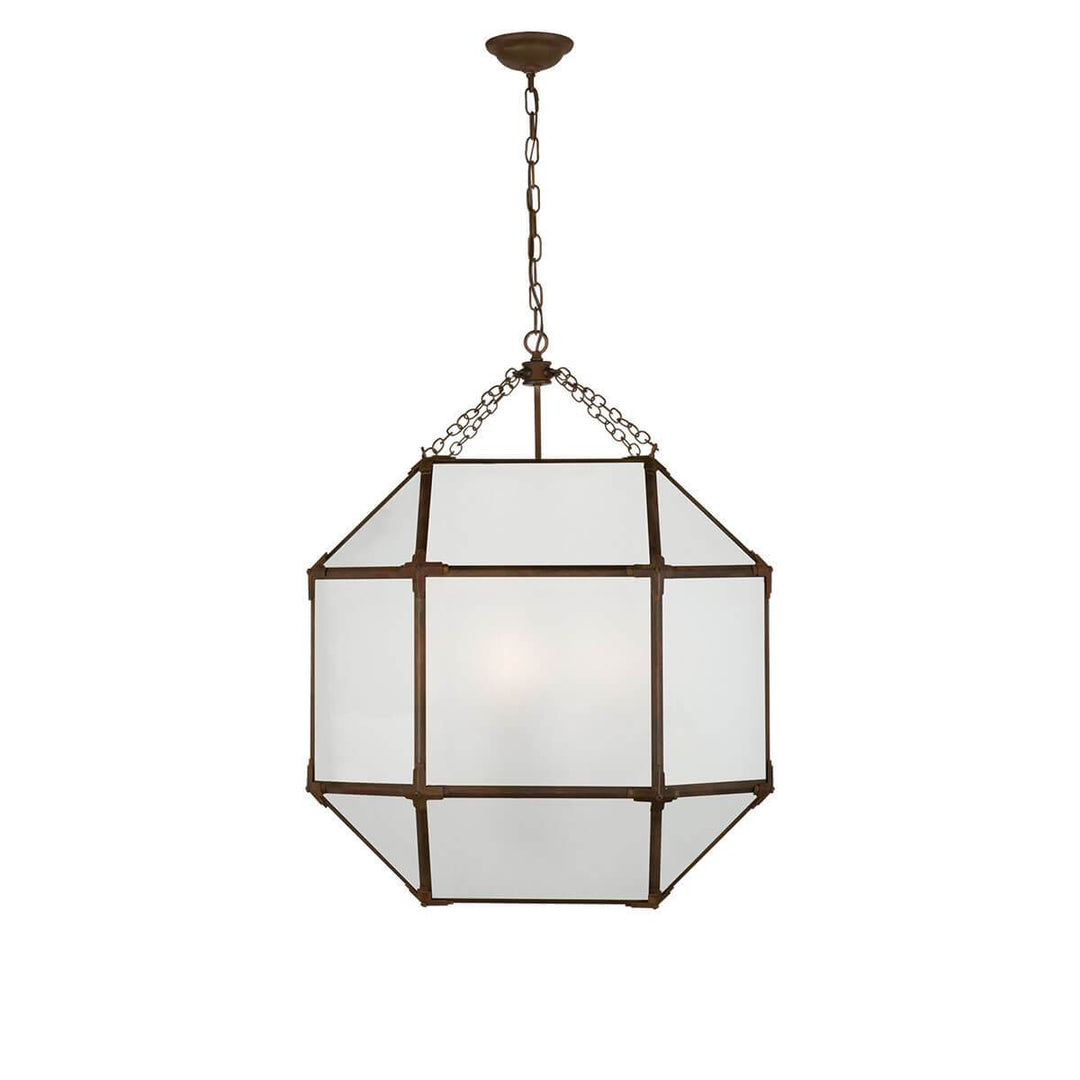 The Bruggen Large Lantern has three candelabra lights in the middle of an antique zinc cage-like frame with visible joints and frosted glass panels.