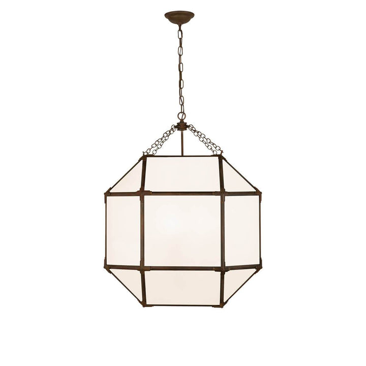The Bruggen Large Lantern has three candelabra lights in the middle of an antique zinc cage-like frame with visible joints and white glass panels.