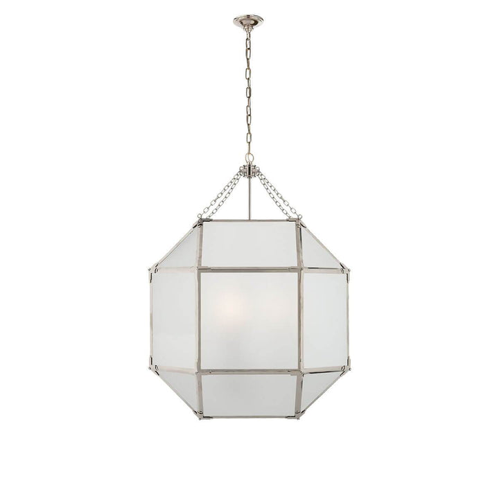 The Bruggen Large Lantern has three candelabra lights in the middle of a polished nickel cage-like frame with visible joints and frosted glass panels.