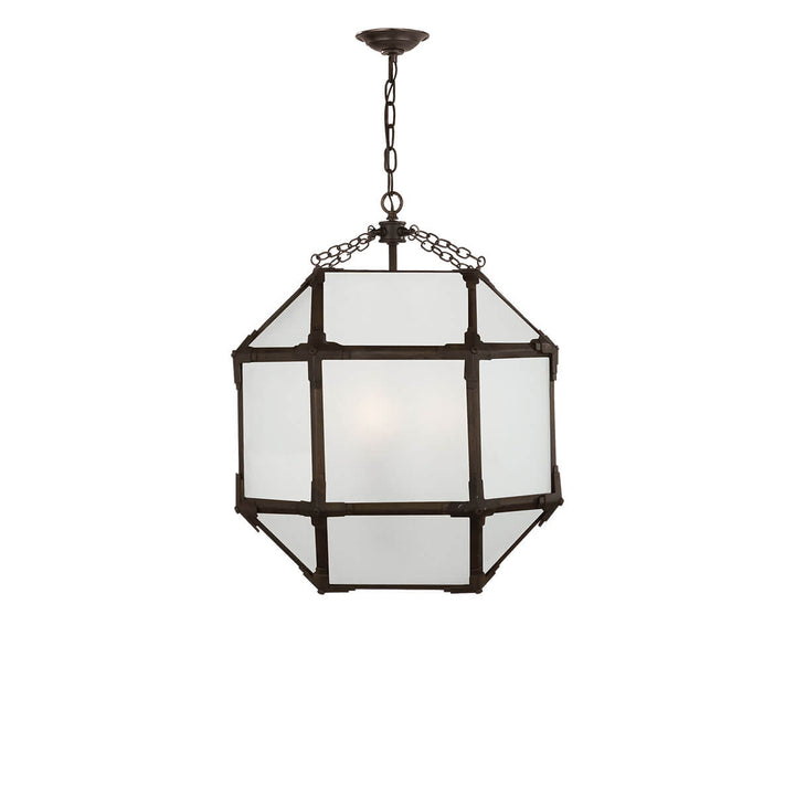 The Bruggen Medium Lantern has three candelabra lights in the middle of an antique zinc cage-like frame with visible joints and frosted glass panels.
