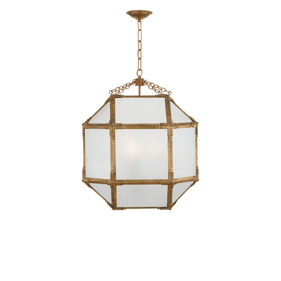The Bruggen Medium Lantern has three candelabra lights in the middle of a gilded iron cage-like frame with visible joints and frosted glass panels.