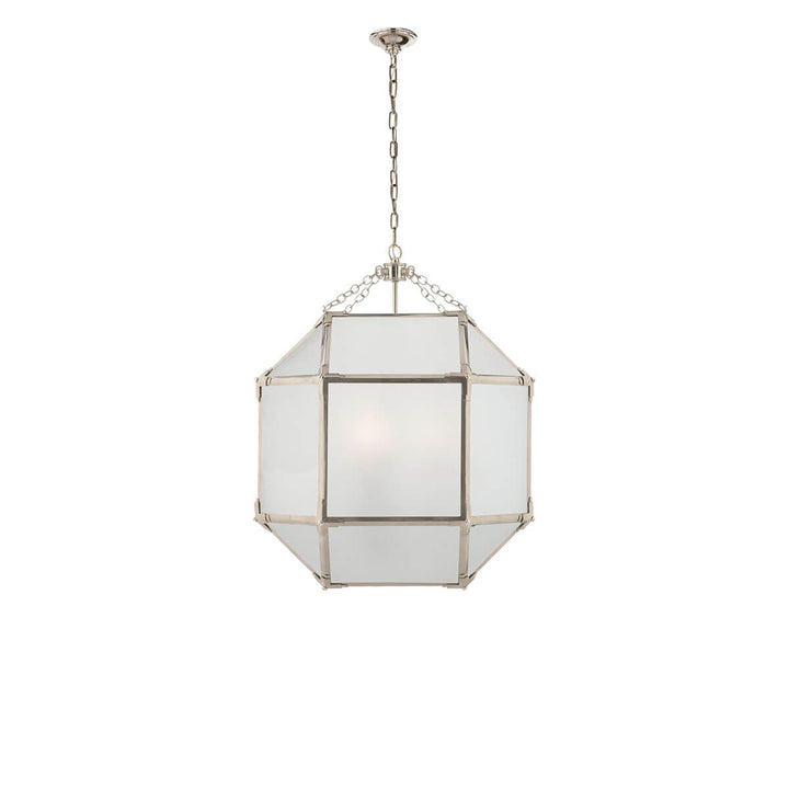 The Bruggen Medium Lantern has three candelabra lights in the middle of a polished nickel cage-like frame with visible joints and frosted glass panels.