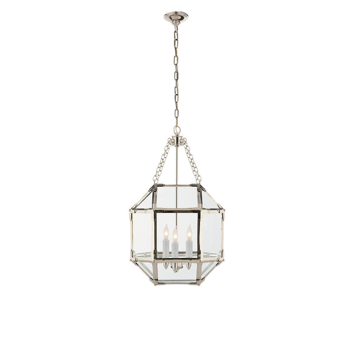 The Morris Lantern has three candelabra lights in the middle of a polished nickel cage-like frame with visible joints and clear glass panels.