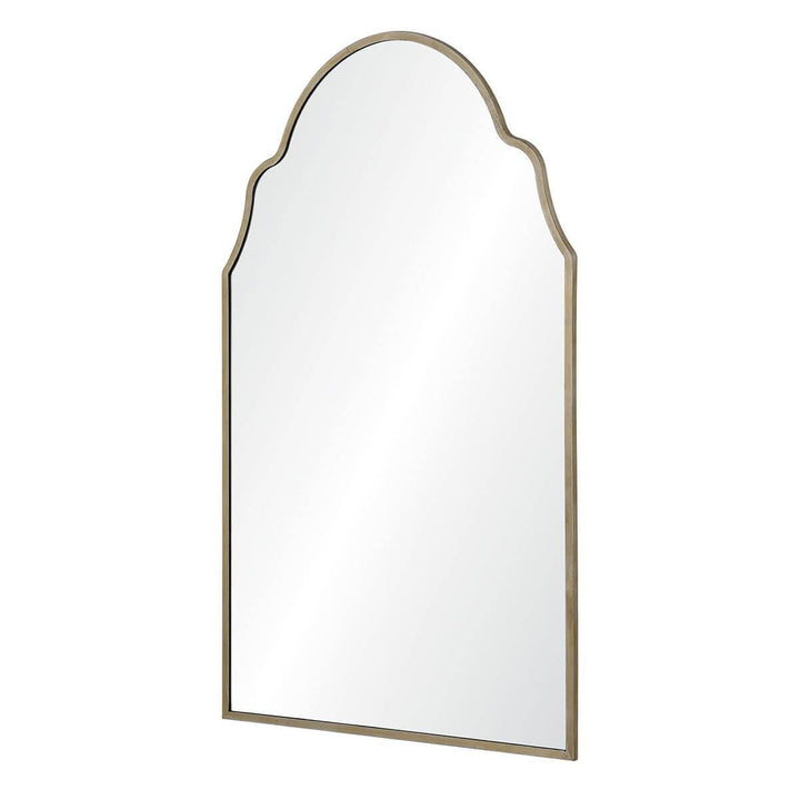 Antique silver mirror with a thin frame and a scalloped boho shape.
