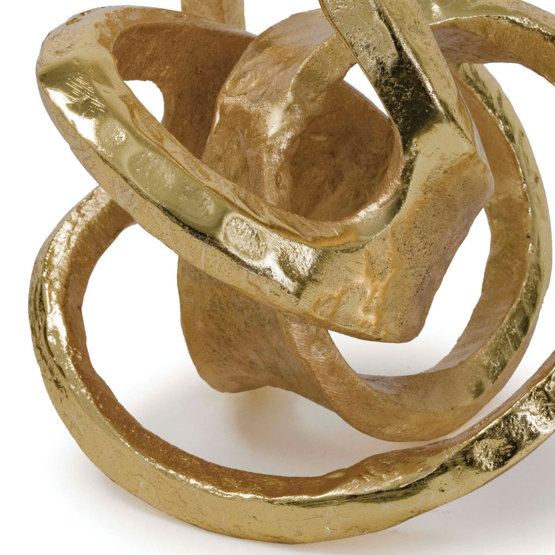 Modern gold knot decorative object. Textural gold finish on aluminum.