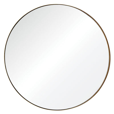 The Obzor Mirror is a large, round mirror with a thin gold frame.