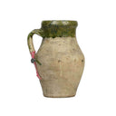 Small clay pot with unique carved details and olive green glaze details.