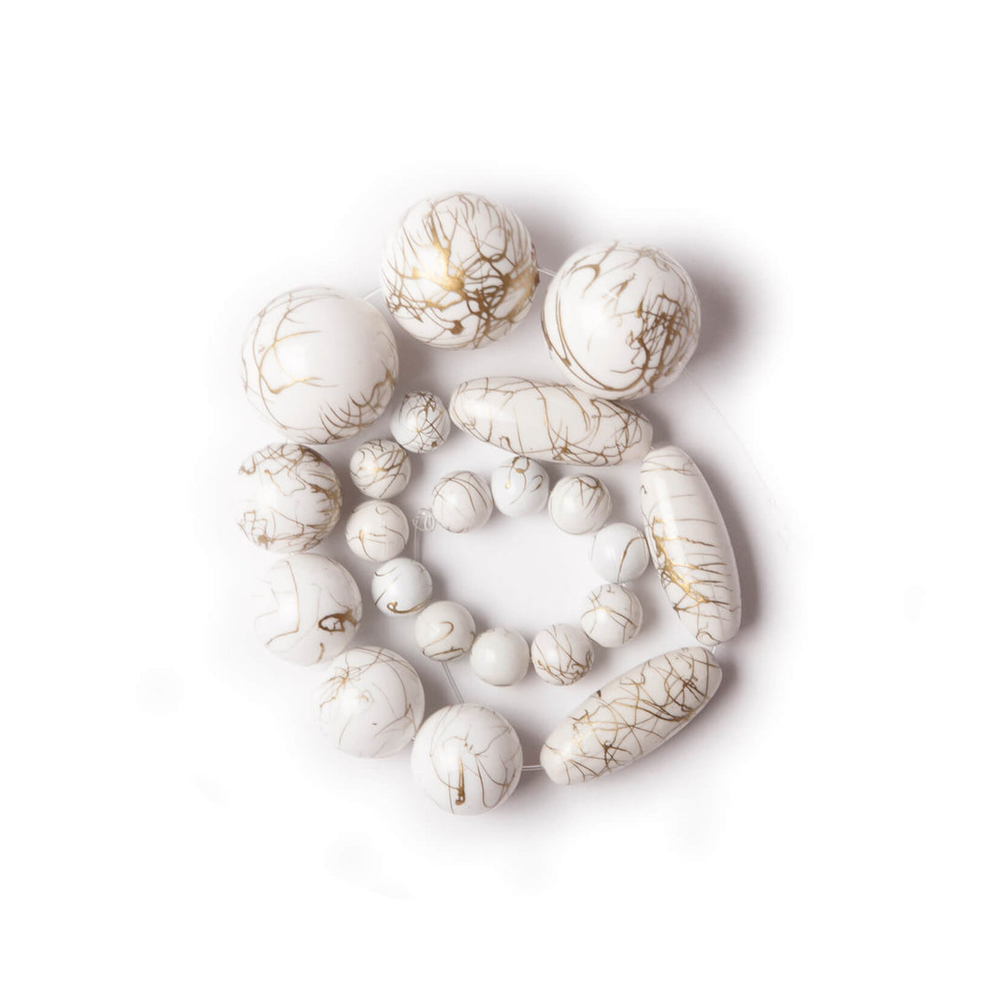 White swirl beads for the beaded, coastal inspired chandelier.