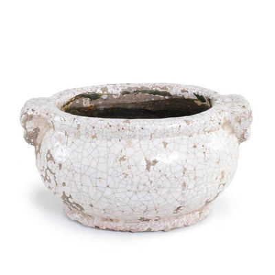 The Rio Bec Pot is a round terracotta planter with handles and a white crackle glaze finish.